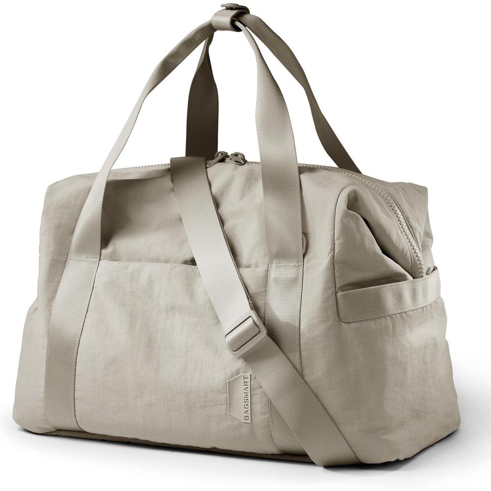 imageBAGSMART Gym Bag for Women Carry on Weekender Overnight Bag Travel Duffel Bags with Trolley Sleeve Personal Item Travel Bag Tote Bag Workout Dance BagBlackMediumBeige
